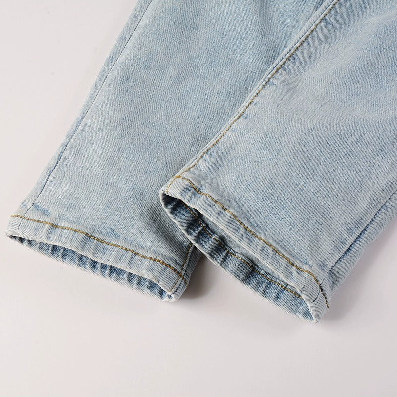 Light Colored Hot Diamond Patch With Holes In Elastic Tight Jeans For Men Light Colored Hot Diamond Patch With Holes In Elastic Tight Jeans For Men