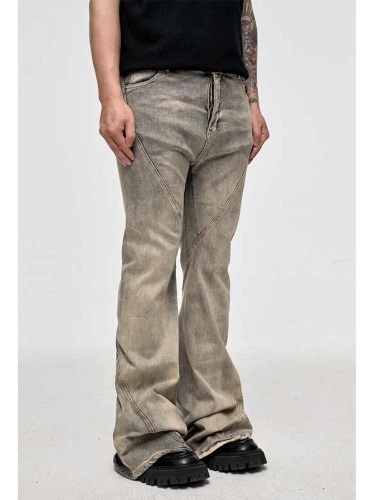 Splicing Washing Mud Dyeing Worn Jeans Splicing Washing Mud Dyeing Worn Jeans