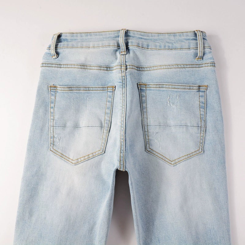 Light Colored Hot Diamond Patch With Holes In Elastic Tight Jeans For Men Light Colored Hot Diamond Patch With Holes In Elastic Tight Jeans For Men
