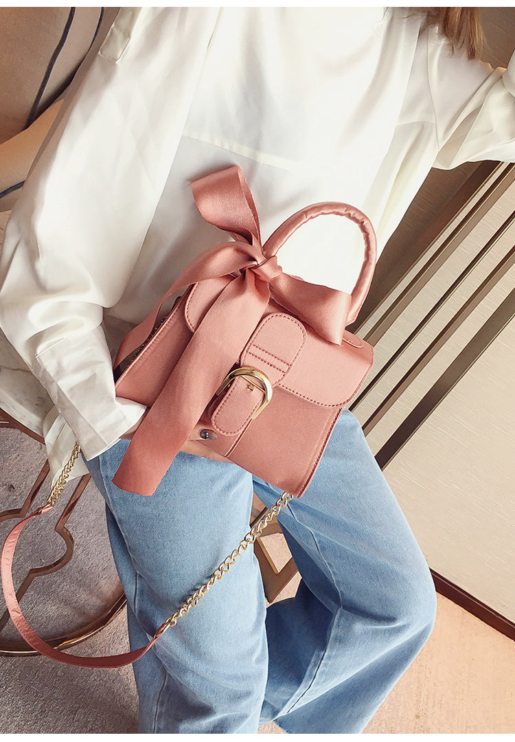 Bow diagonal handbag