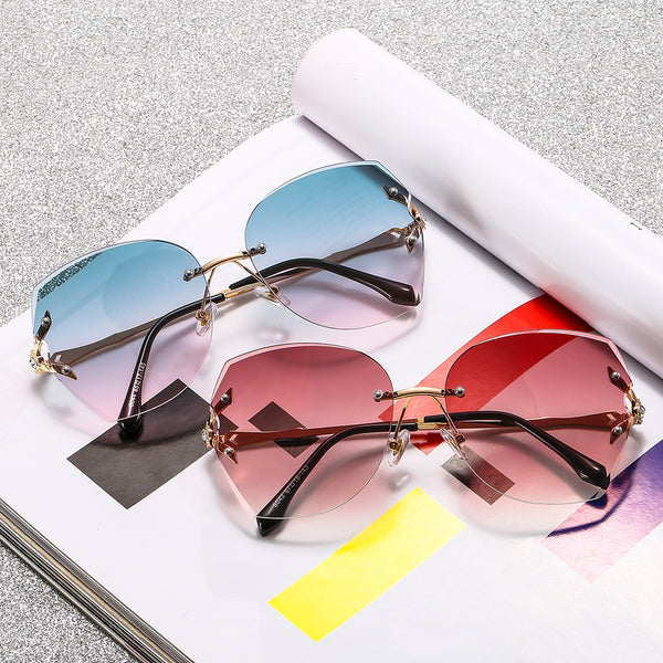 Women's frameless trimmed sunglasses