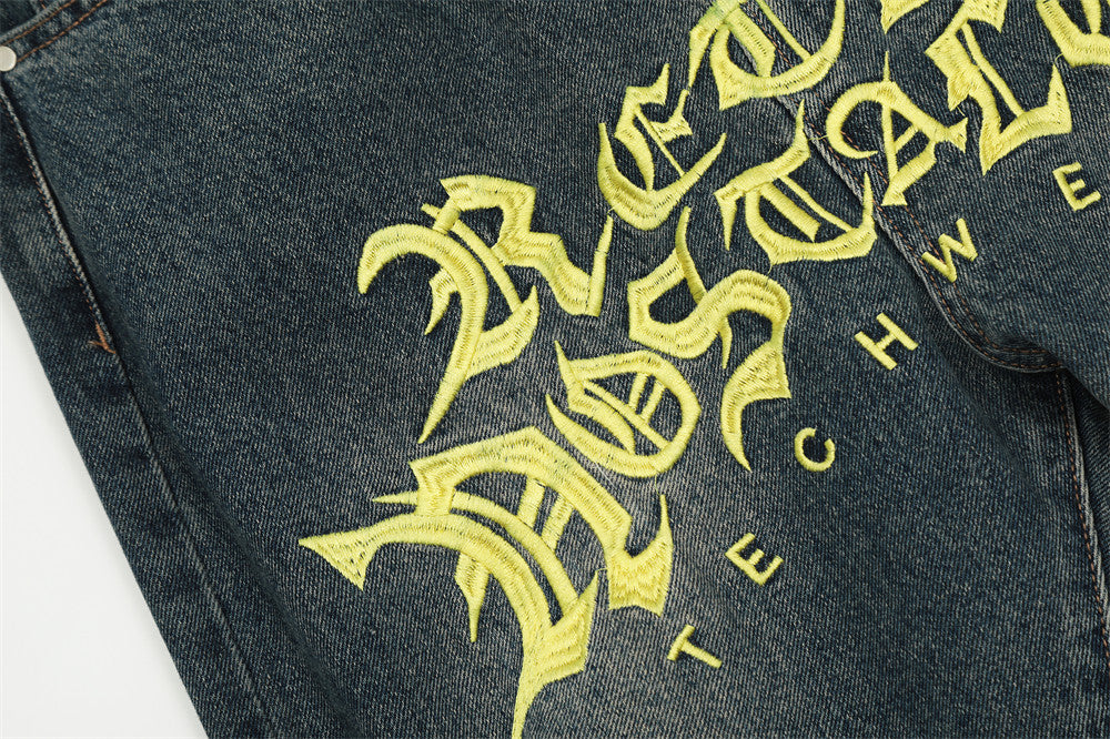 Embroidery Hole Slightly Flared Jeans Men