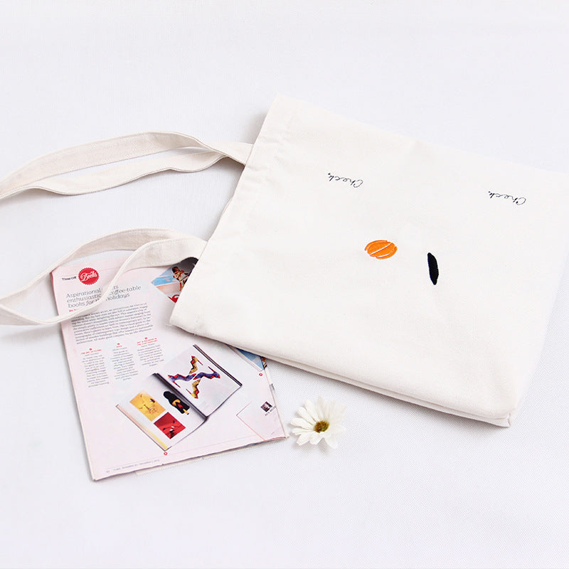 Embroidered canvas bag handbag