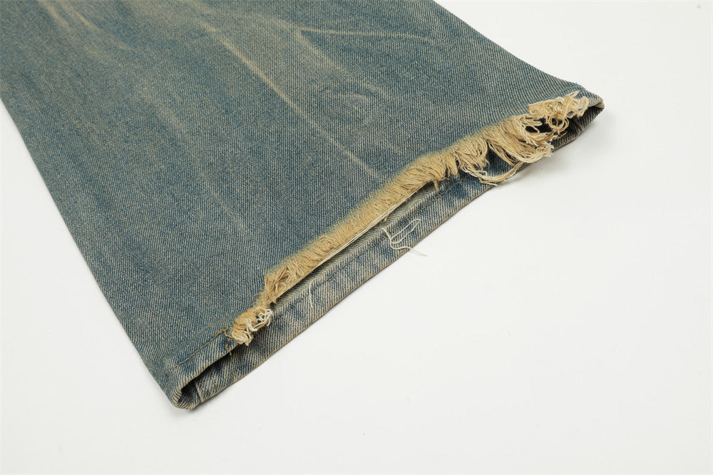 Washed And Worn Ripped Jeans For Men