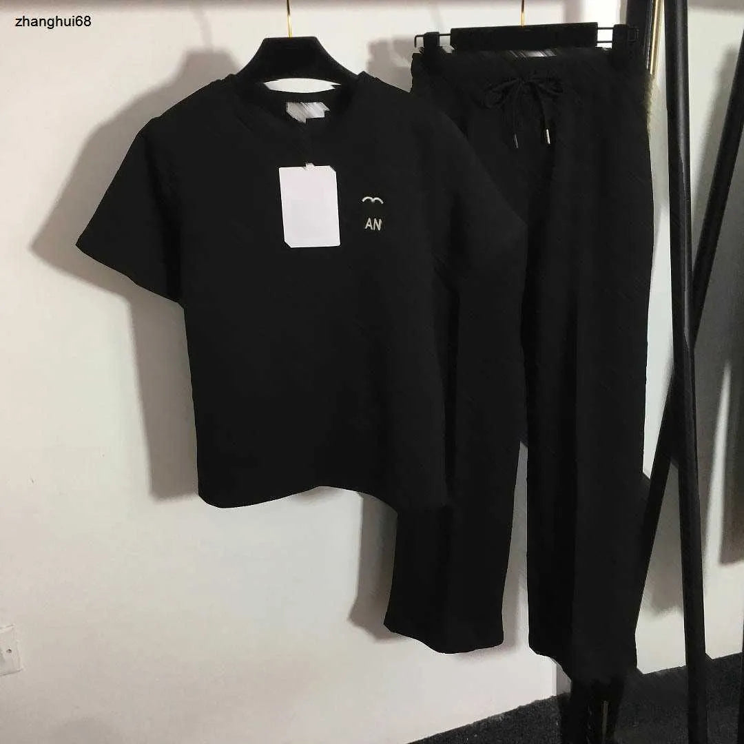 23ss womens designer clothing Womens Tracksuits Presbyopia logo embossed short sleeve T-shirt elastic waist casual wide leg trousers set Women Clothes