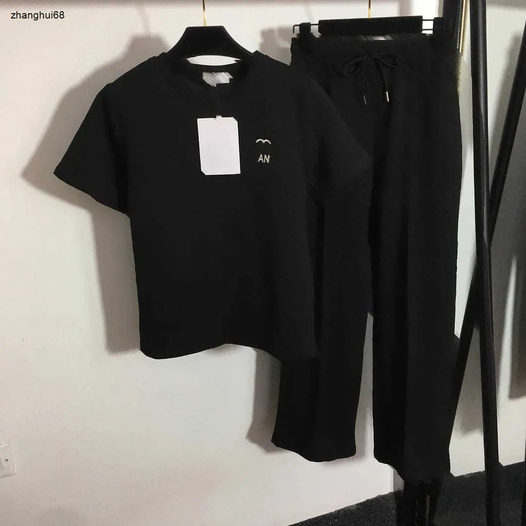 23ss womens designer clothing Womens Tracksuits Presbyopia logo embossed short sleeve T-shirt elastic waist casual wide leg trousers set Women Clothes